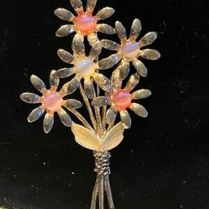 VINTAGE BOUQUET BROOCH WITH FIVE CAT’S EYE STONES GUN METAL